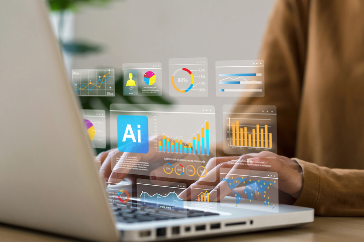 analyst works on laptop showing business analytics dashboard with charts, metrics, and kpi to analyze performance and create insight reports for operations management. ai technology analyzes big data